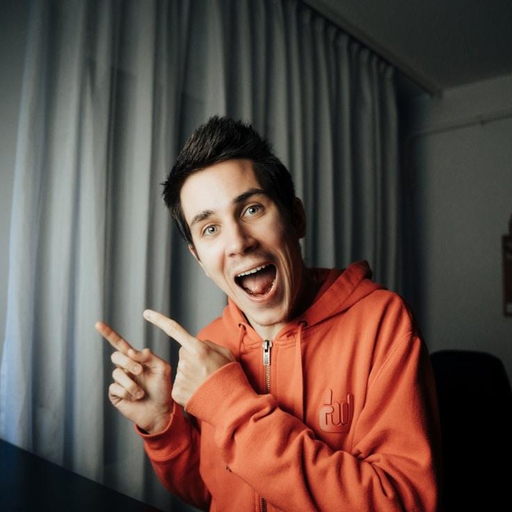 Amara Singh, Lead Floral Designer at Pearl Grove Frame, reviewing corporate floral arrangements